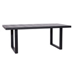 Moderne eettafel Blax met zwart metalen onderstel en houten blad.