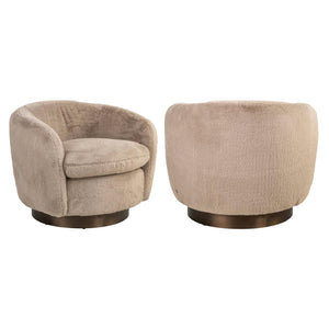 Lounge stoel Colmar in khaki fluffy stof, draaibaar en comfortabel.
