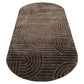 Donkerbruin vloerkleed met geometrisch patroon van Richmond Interiors.