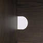 Modern TV-meubel Nando in donker hout met ronde opening.