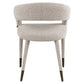 Eetkamerstoel Gia in naturel met houten poten en comfortabele bekleding.