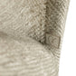 Close-up van de zachte, natuurlijke stof van de Amely eetkamerstoel.